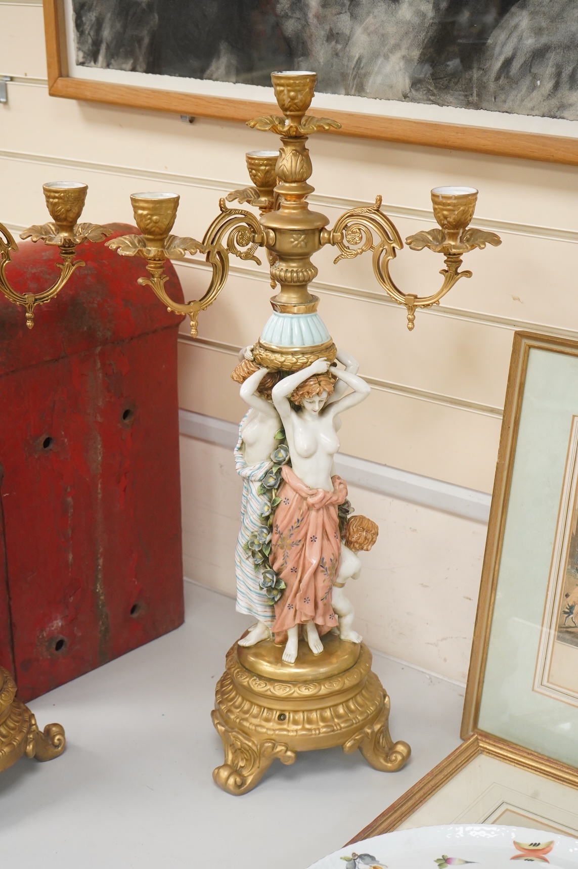 A pair of mid 20th century Italian porcelain and gilt metal mounted figural candelabra- 69cm high